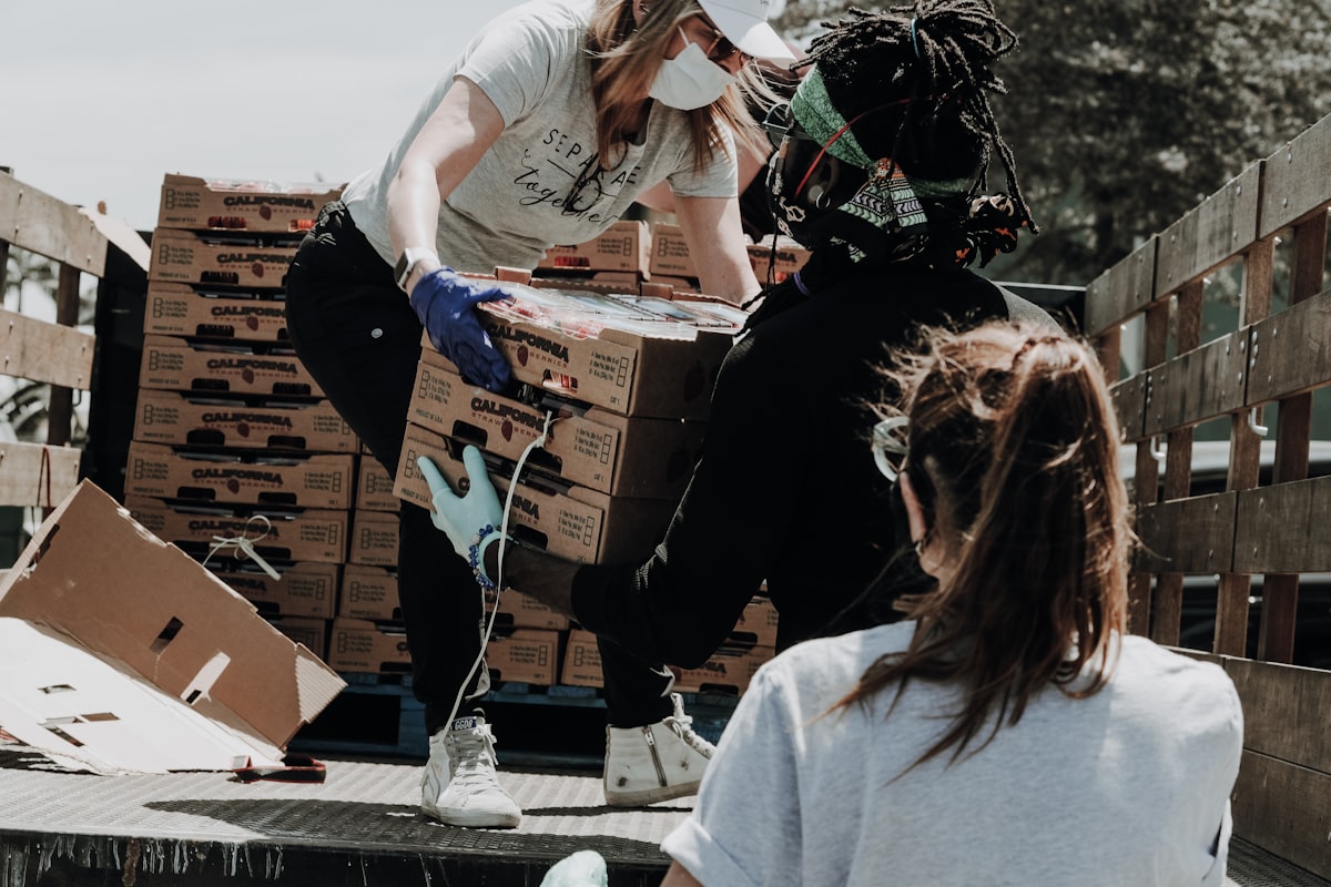 People sorting donated goods for charity
